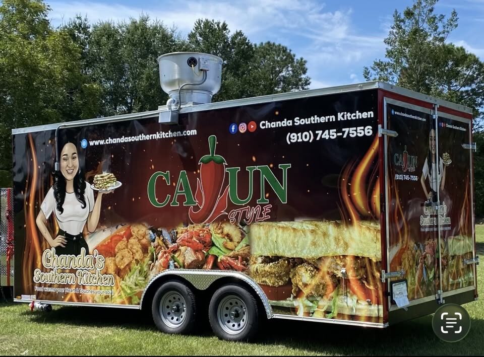Chanda&rsquo;s Southern Kitchen food trailer, wrapped in flames with a Cajun Style logo